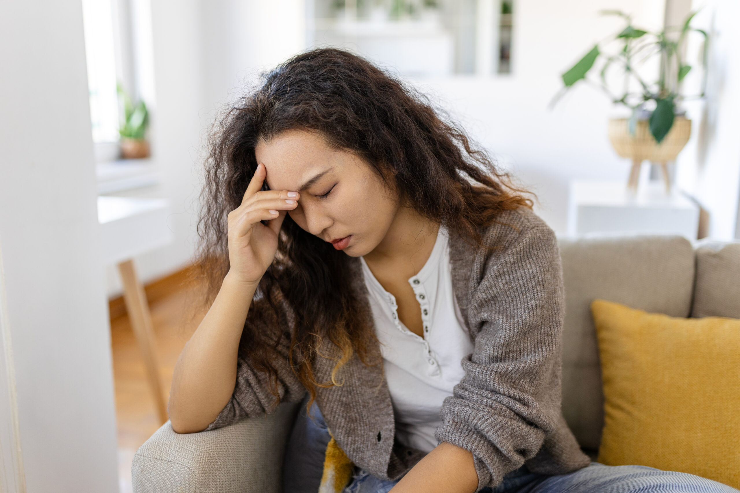 Woman experiencing brain fog and fatigue during the perimenopause timeline